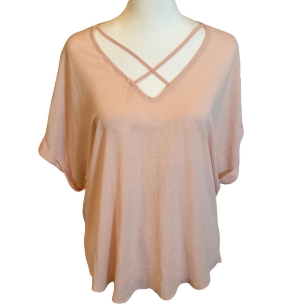 Lush short-cuffed sleeveblouse. Size XS. Light pink, semi sheer. Pretty!